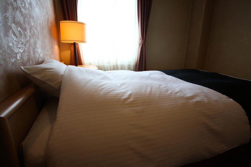 Apa Hotel Sapporo Susukino Eki Minami Bagian luar foto