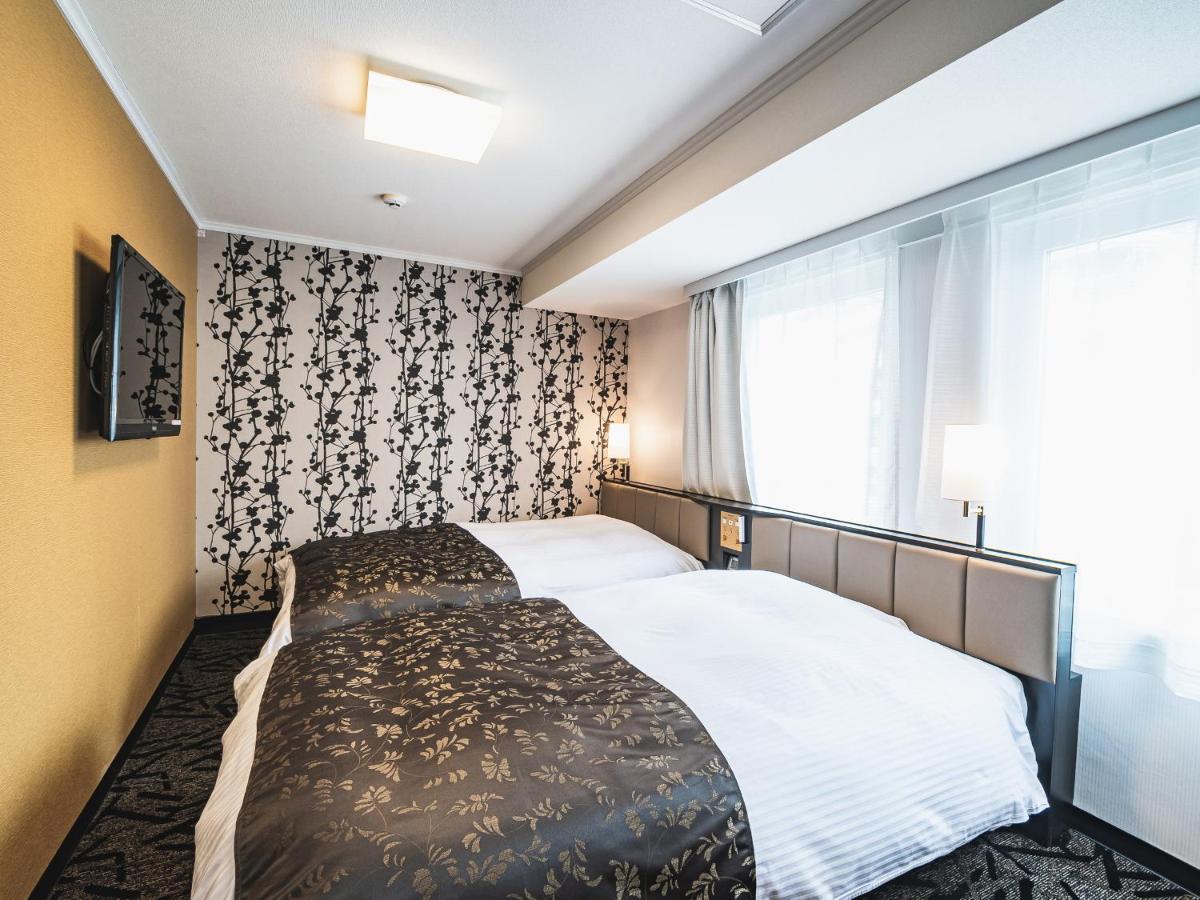 Apa Hotel Sapporo Susukino Eki Minami Bagian luar foto